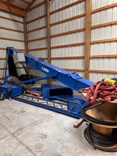 ELECTRIC RAILCAR UNLOADING SYSTEM